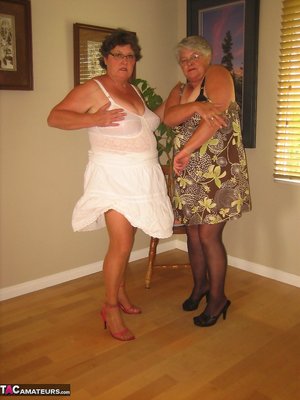 TAC Amateurs are pleased to offer you a free photos featuring Girdle Goddess in some playful lesbian foreplay